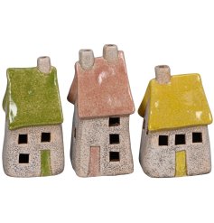 a stoneware light up house 