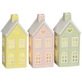 Delight in the warm glow of this charming porcelain LED house ornament