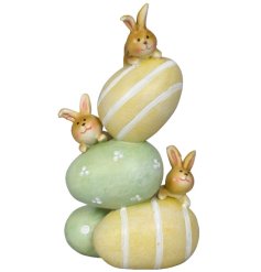 Add a charming touch to your space with the Egg & Bunny Deco