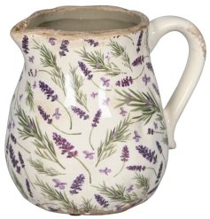 A charming country stoneware jug with a rustic finish. 