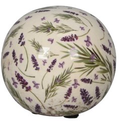 A rustic stoneware sphere with a charming purple lavender design and soft crackle glaze.