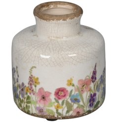 Compact glazed vase made of stoneware with a smooth finish.