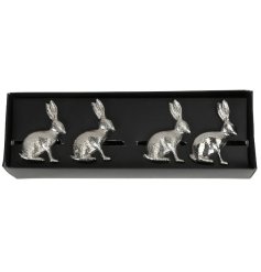 Adorable silver bunny napkin holder with a charming design.
