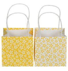 Brighten your gift-giving with this charming Daisy Yellow Paper Gift Bag