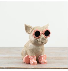 Charming resin pig ornament with natural tones, pink accents, stylish glasses, and colourful wellie