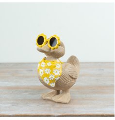 Enhance your décor with this 8.4" resin duck sporting cool sunglasses for a fun, charming vibe.