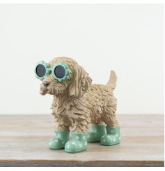  a charming Cockapoo figurine, featuring quirky flower-shaped glasses 