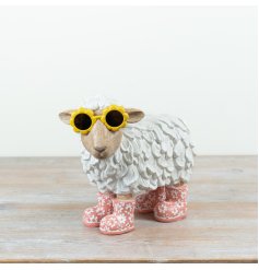 Cheerful sheep ornament wearing sunglasses and rain boots, perfect for a playful touch.