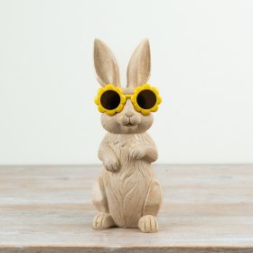 Bring charm with this resin bunny adorned in cute flower-shaped glasses.