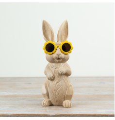 Bring charm home with this resin bunny sporting cute flower-shaped glasses.