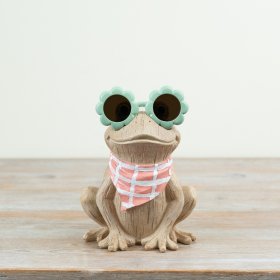 Bring charm and whimsy to your home or garden with this delightful decorative piece.