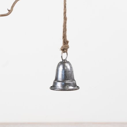 A compact metal bell finished in brushed silver and suspended from natural jute rope. 