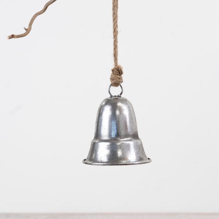 A decorative metal bell in a brushed silver finish, complete with natural jute rope for easy hanging.