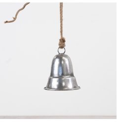 A smaller metal hanging bell finished in silver with a sturdy jute string.