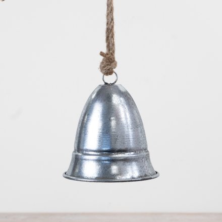A decorative metal bell in a brushed silver finish, complete with natural jute rope for easy hanging