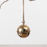 6cm metal bell in antique gold with charming star-shaped cut-outs, perfect for hanging decor.