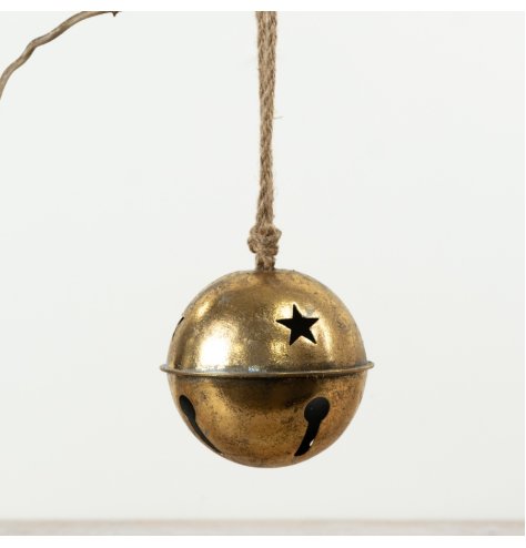 Hanging bell in antique gold with charming star-shaped cut-out designs for a warm, decorative touch.