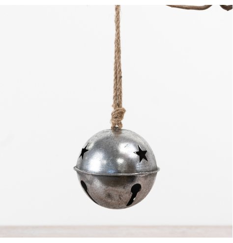 14cm metal hanging bell with distressed silver finish and star-shaped cut-out design for charming decor.