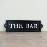 a quirky the bar sign 