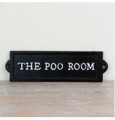 A humorous wall sign made from cast iron with the words 'the poo room'. 