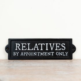 Vintage-style cast iron sign with a rustic charm.