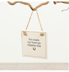 charming sign  featuring the sweet phrase "You Make My Heart Go Clippity Clop."