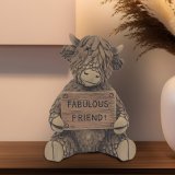 a resin ornamnet holding fabulous friend plaque 