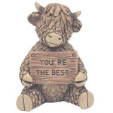 Meet Hughie the Highland Cow! This charming brown polyresin ornament, holding a "You Are The Best" sign,