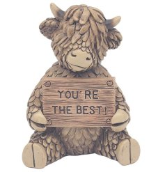 Meet Hughie the Highland Cow! This charming brown polyresin ornament, holding a "You Are The Best" sign,