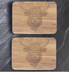 Set of chic wooden placemats featuring highland cow design.