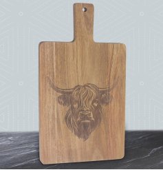 Made from eco-friendly wood, this Highland Cow Cutting Board is an essential kitchen staple.