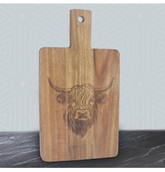 Rustic wooden chopping board featuring a highland cow design.