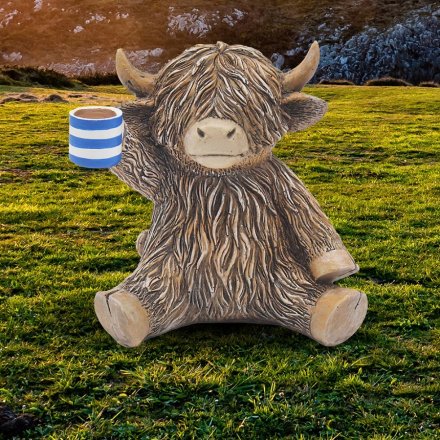 Highland Cow  Holding a Cuppa
