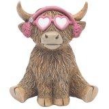 a fun highland cow with sunglasses and ear moofs figurine 