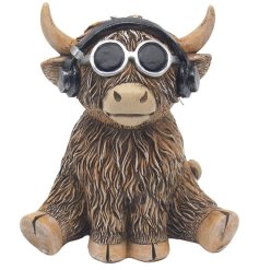 A fun highland cow with dj headphones 