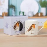 Delightful coffee or tea mug featuring a cute robin design.