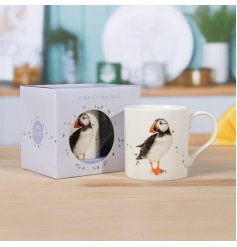 Charming puffin themed mug perfect for savouring your coffee or tea.