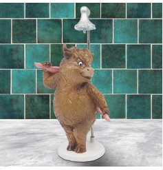 Add rustic charm to your bathroom with this delightful Highland Cow in the Shower ornament