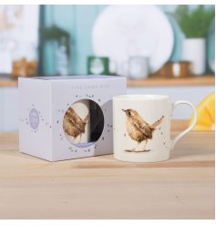 Sip in style with the Wren Mug charming bird motif