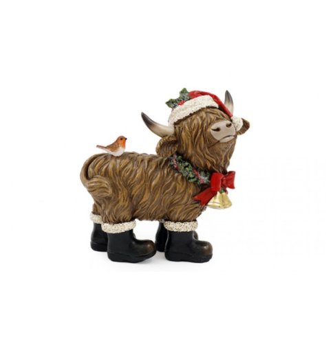 Bring warm festive charm to your home with this cozy highland cow decoration.