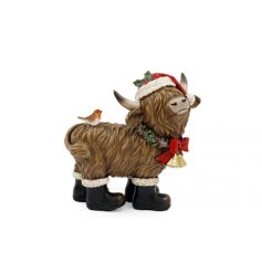 Add a cozy festive charm to your home with this highland cow deco