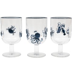 Enhance your table setting with this 15.5cm Sealife-themed wine glass.