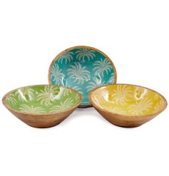 Colorful serving bowl featuring a lively palm leaf design