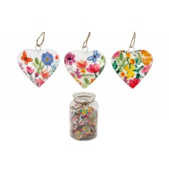 a charming hanging heart adored with lovely flowers and butterflies