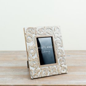 Stylish 2-wood and glass photo frame featuring a graceful swirl flower pattern.
