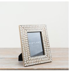Chic rustic wooden frame with a unique pattern.