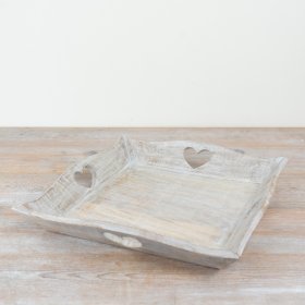 Delightful wooden tray featuring heart-shaped cut-out accents.