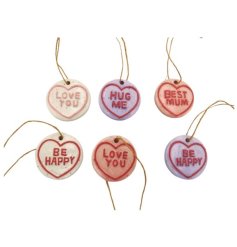 Decorate with this 4cm Ceramic Love Heart Hanging Ornament, showcasing a sweet message and vibrant design.