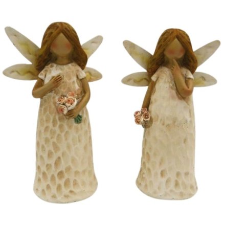 Add a touch of magic with this Resin Fairy Figure, 