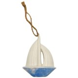 Add a charming coastal touch with this 8.5cm ceramic hanging boat